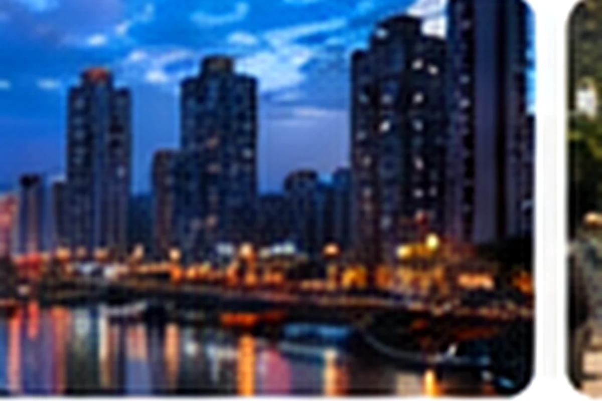Night city river and airport/rail hub feeling